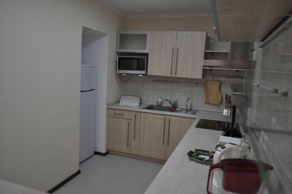 Sunrise Apartments Triumph Астана Стая снимка