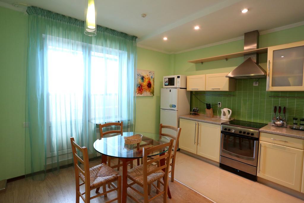 Sunrise Apartments Triumph Астана Стая снимка