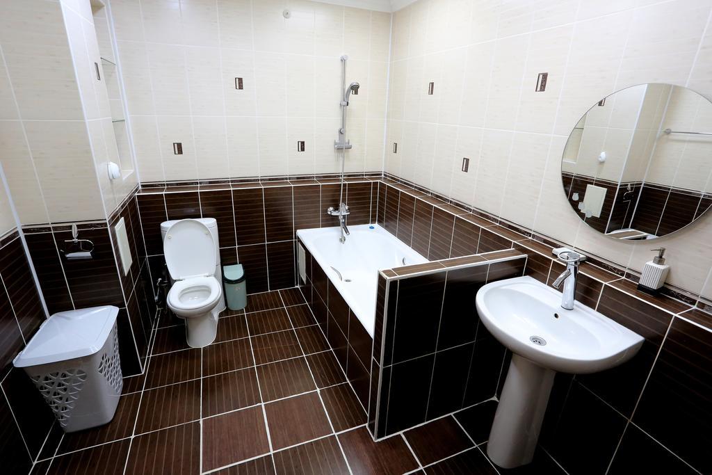 Sunrise Apartments Triumph Астана Стая снимка